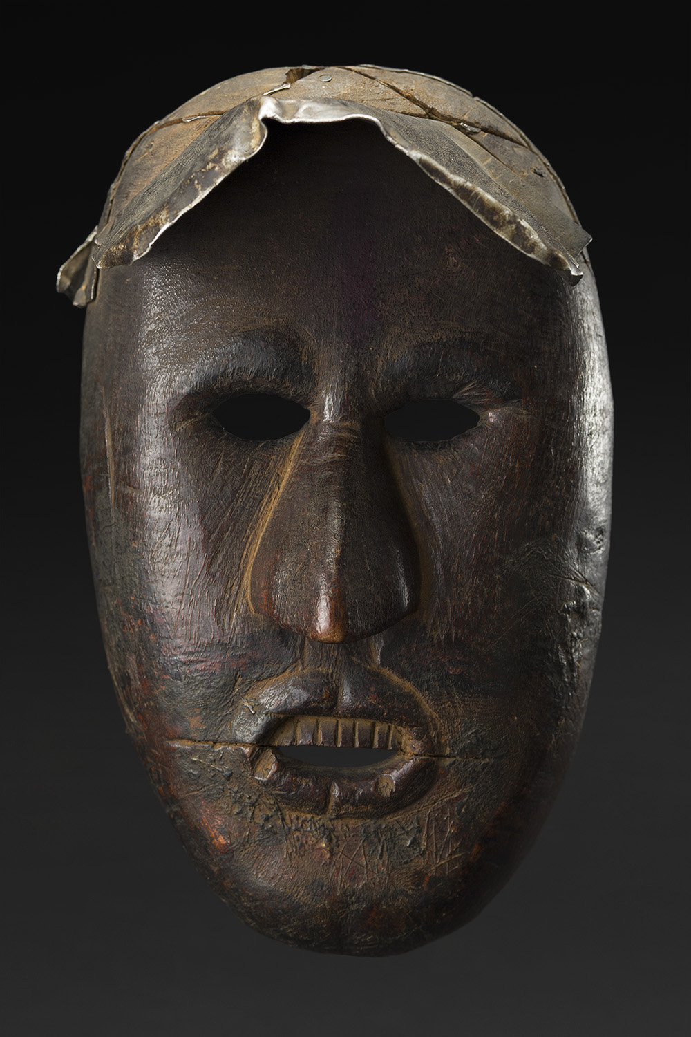  Masks    Nepal  , Early 20th C. Wood, metal 9 x 5.5 x 6.5 inches 22.9 x 14 x 16.5 cm M 223s 