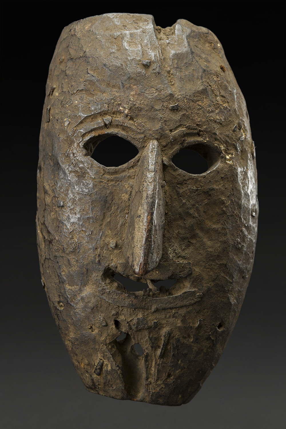   Masks    Nepal  , Early 20th C. Wood 10.5 x 6 x 4 inches 26.7 x 15.2 x 10.2 cm M 225s 