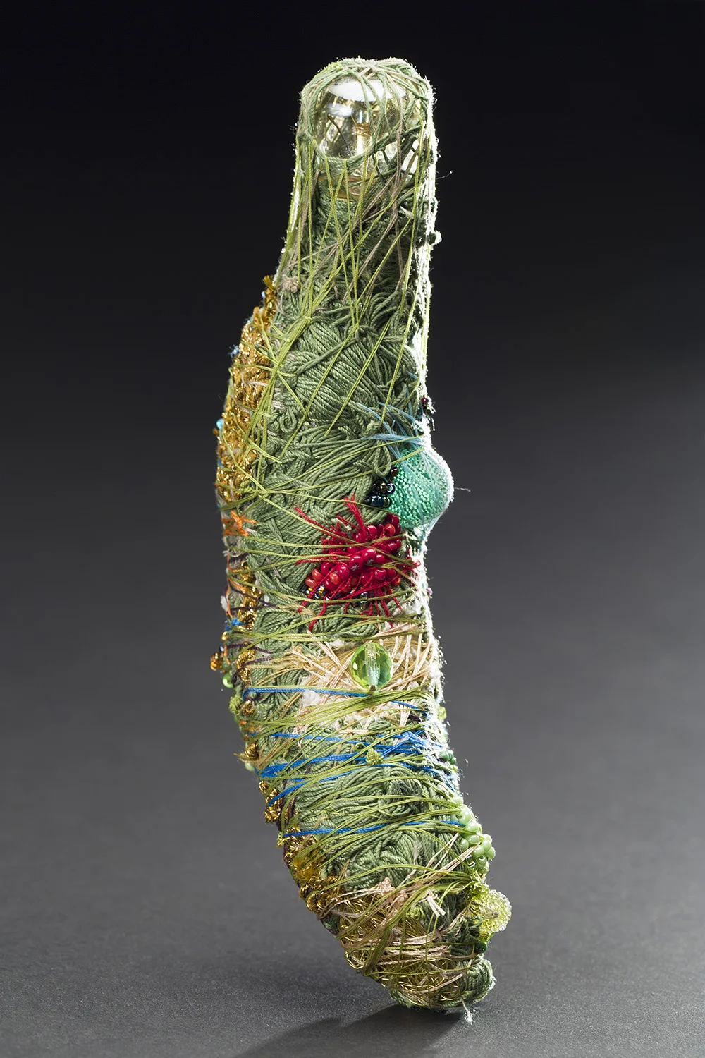 Sandra Sheehy Untitled, 2015 Beads, thread, sequins, fabric, light bulb, wire 7 x 2 x 2 inches 17.8 x 5.1 x 5.1 cm SSe 95