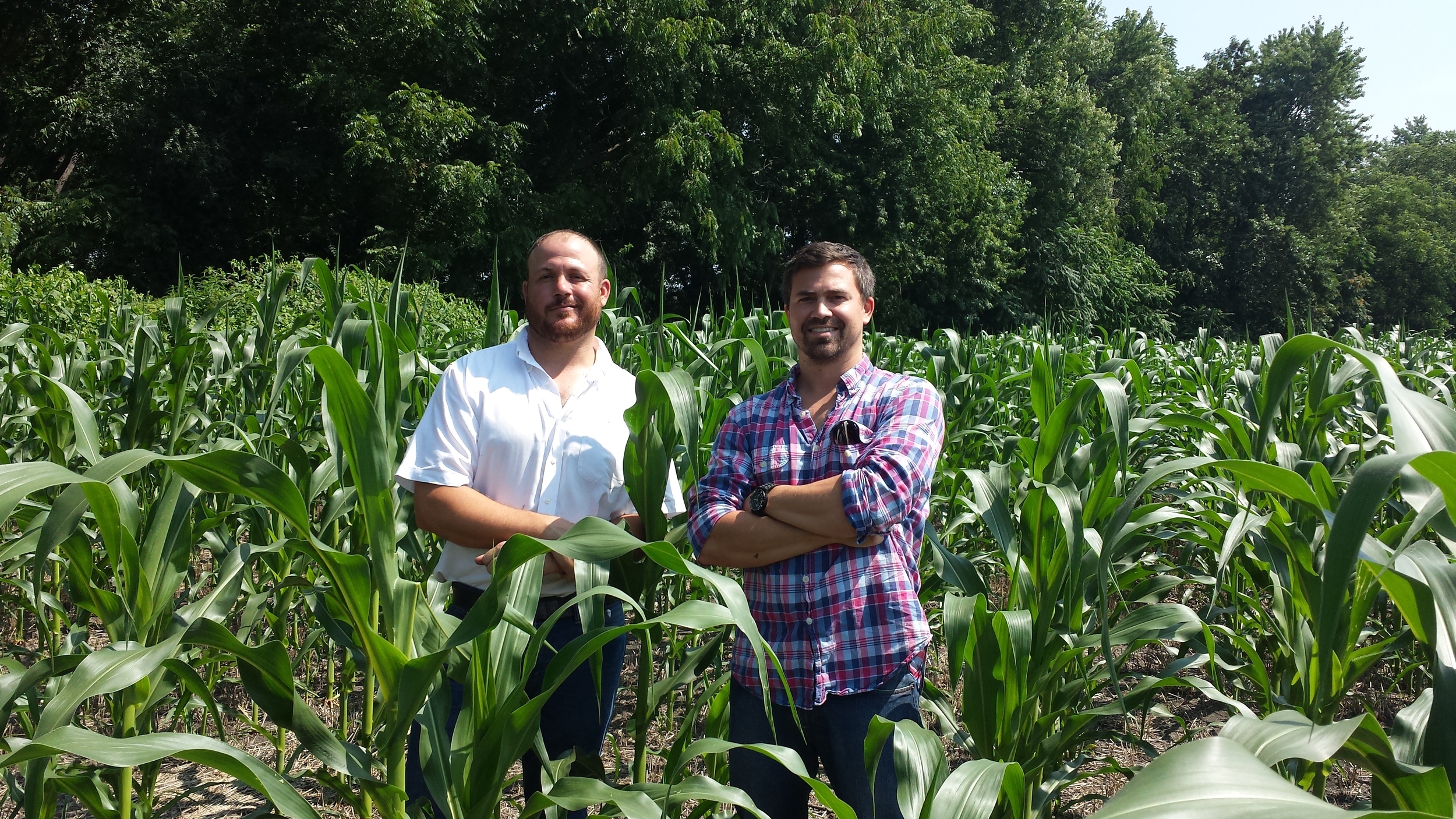 Grizzanti and Kidde in the black dirt fields. - Photo Courtesy of Black Dirt Distillery