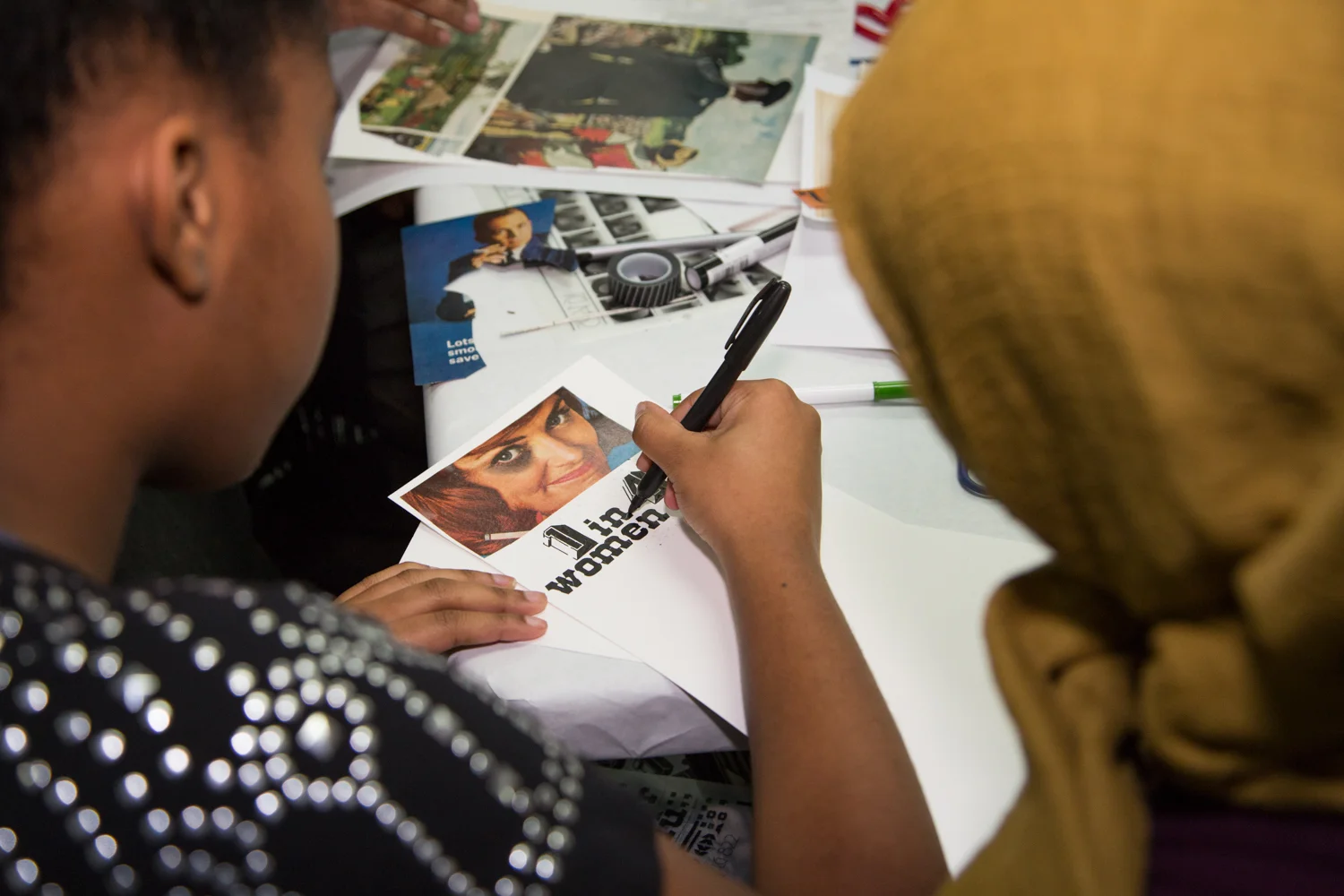 Art apprentices working at Juxtaposition Arts , Minneapolis