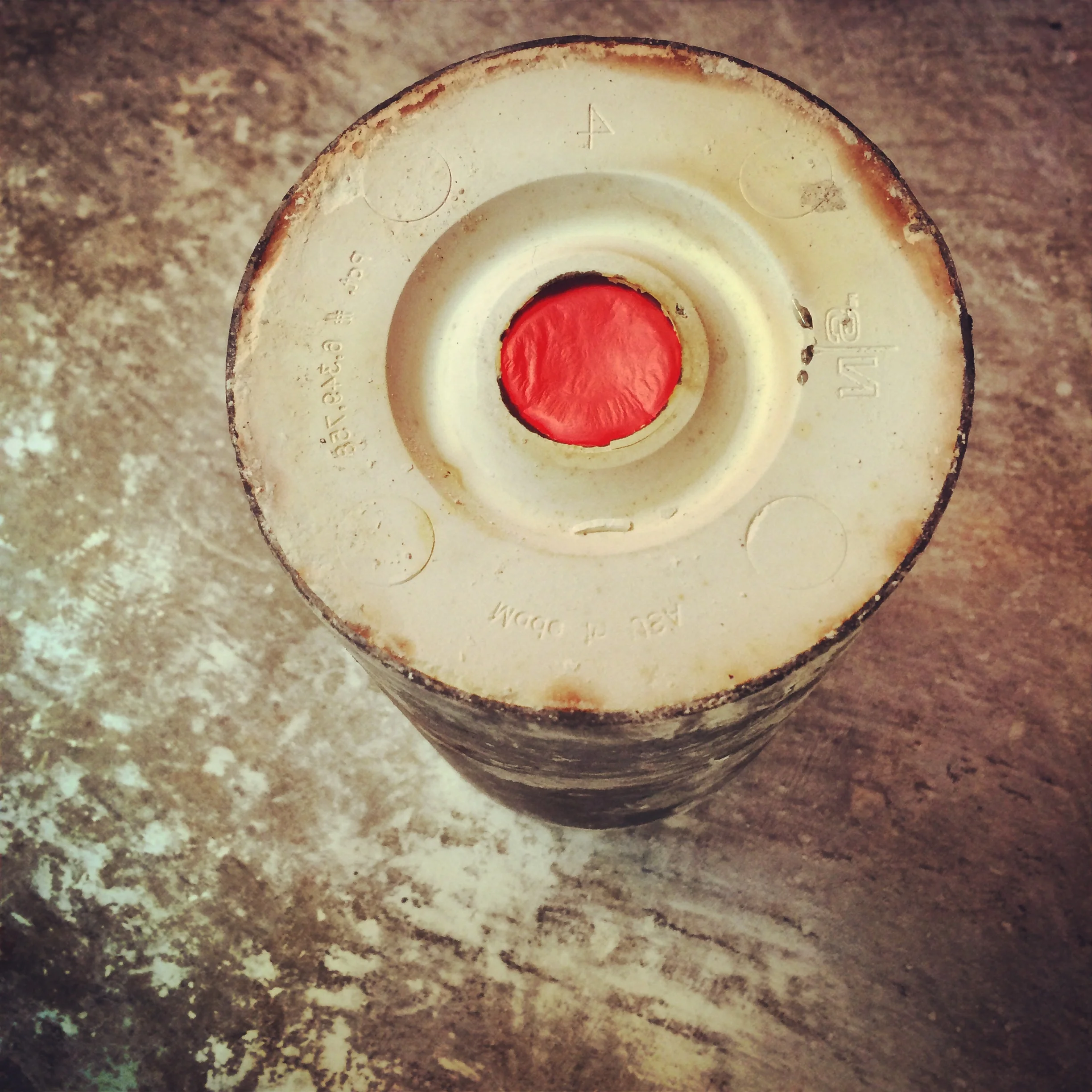 Molten recycled silver cooling in the investment mold.