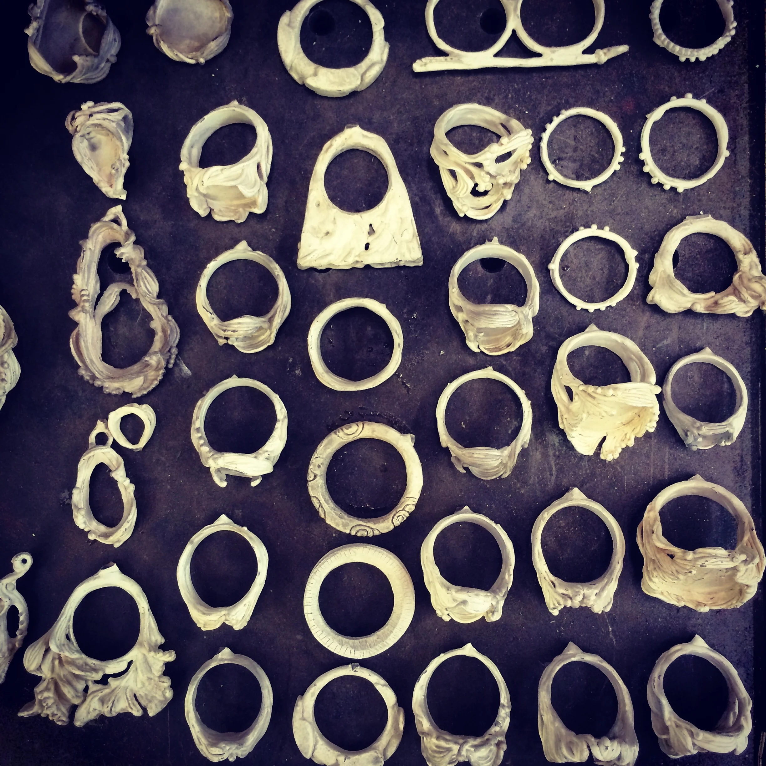 Freshly cast recycled silver rings ready to be cleaned up...