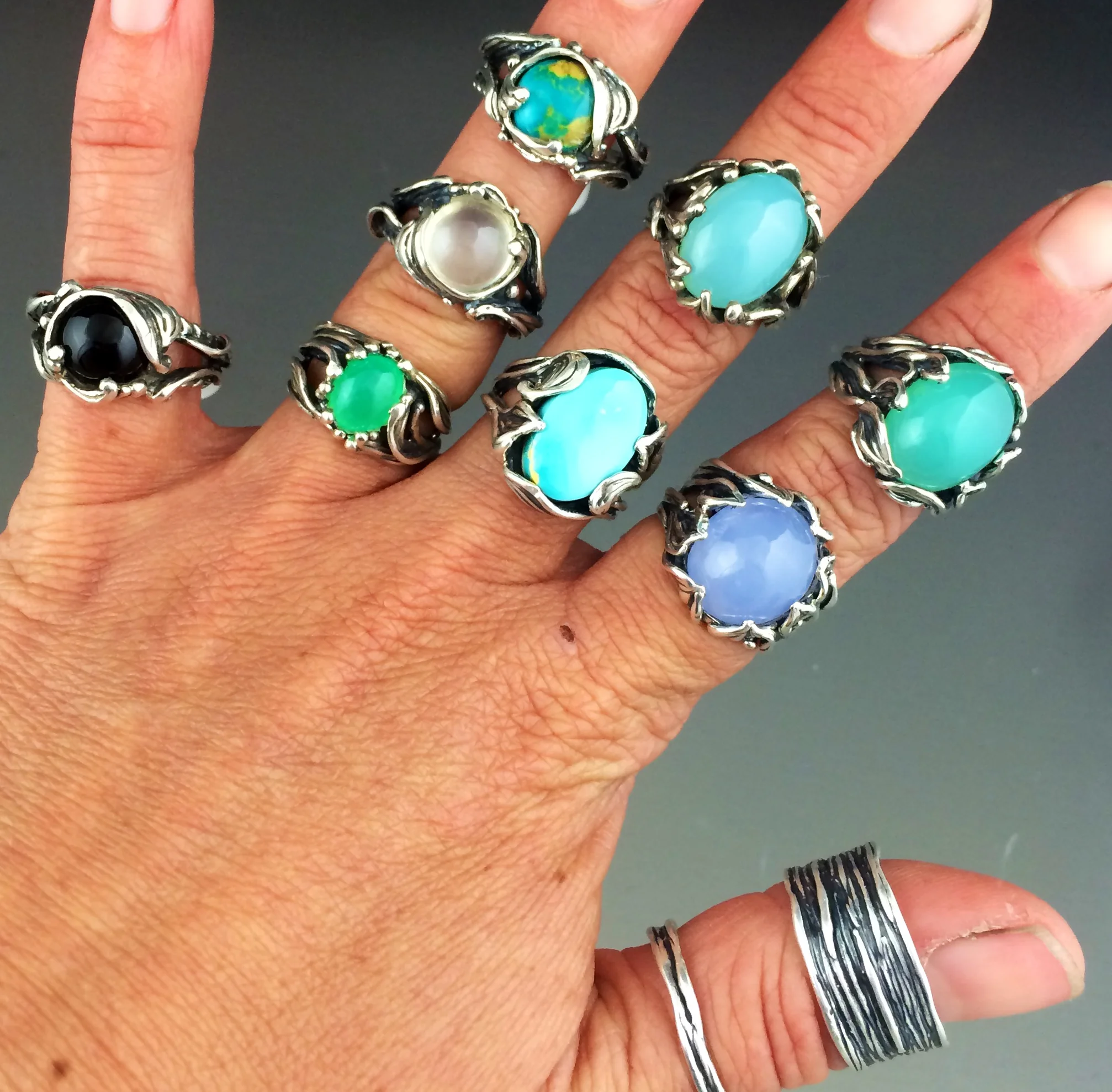 Handmade silver rings cleaned up and set with turquoise, cheysoprase, moonstone, onyx and blue chalcedony.
