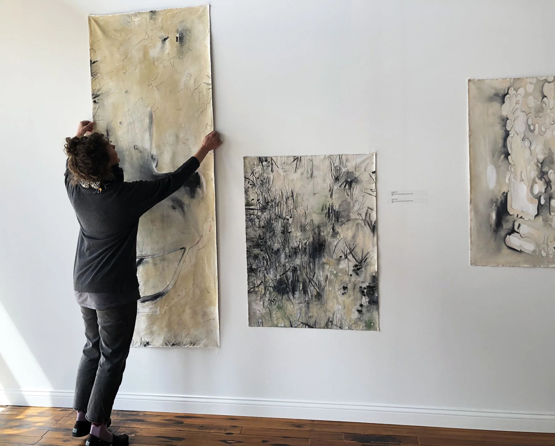  Crystal Hartman installing artwork for the Boneyard Arts Festival, 2022 