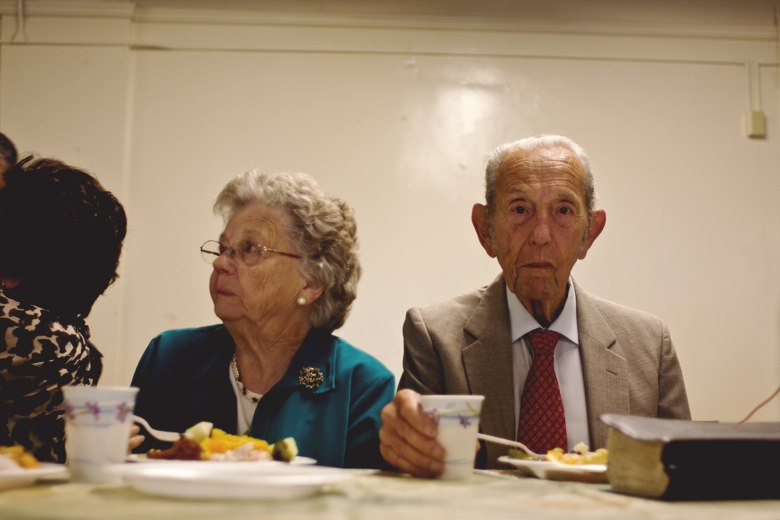 After his last sermon on May 15th, Camping and his wife Shirley enjoy a final meal with the congregation.