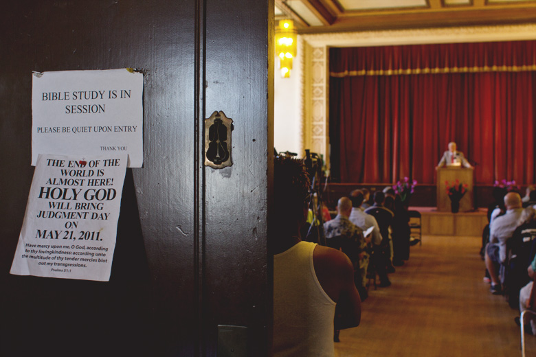 A Sunday service lead by Harold Camping commences at the Veterans Memorial Building outside Oakland.