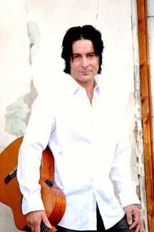 yussiguitarwhite.JPG.jpeg