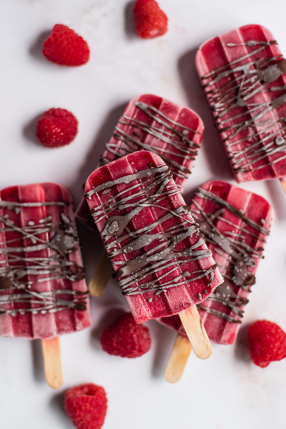 Raspberry Popsicles with Dark Chocolate Drizzle