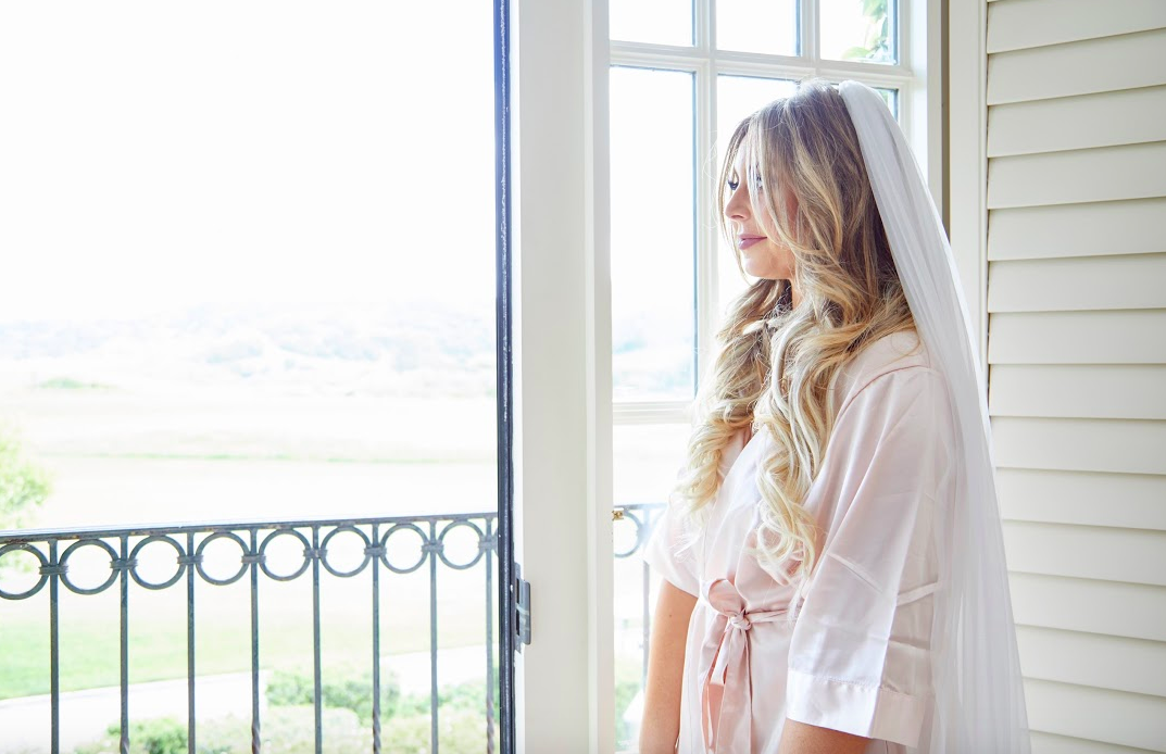 We didn't have much time to take photos in my veil before we walked down the aisle, but we did snag this shot! 