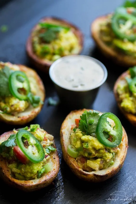 Potato skins are SO overlooked in my household because they usually contain bacon and because of that I NEVER think about them. These looked SO delicious and wouldn't leave you feeling terrible afterwards. With the kick of jalapeno on the top, you're also getting a totally different and delicious flavor combination. Recipe here .