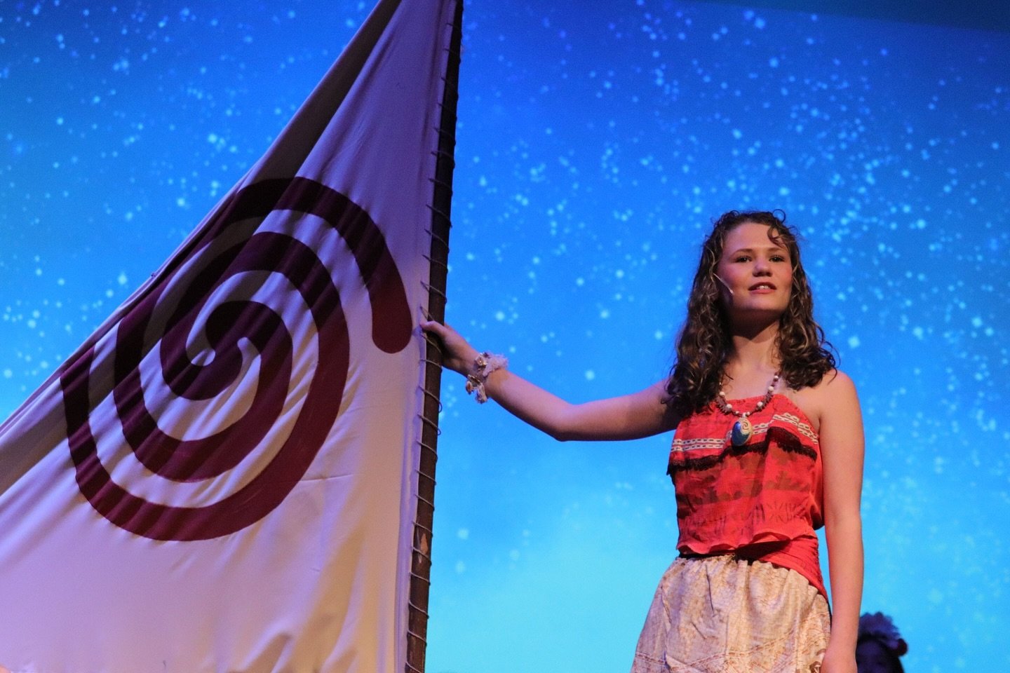 "Student portraying Moana on her boat in Moana Jr at Bedford Youth Performing Company, serving Bedford and Southern NH"