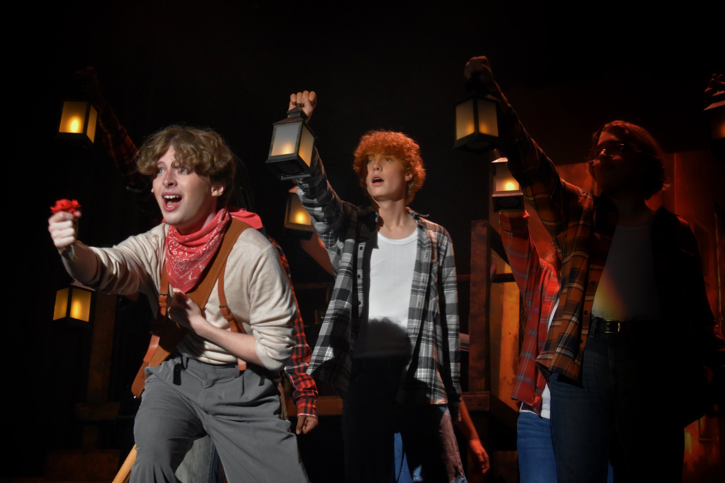 "Teen performers on stage in Hadestown School Edition in partnership with BYPC."