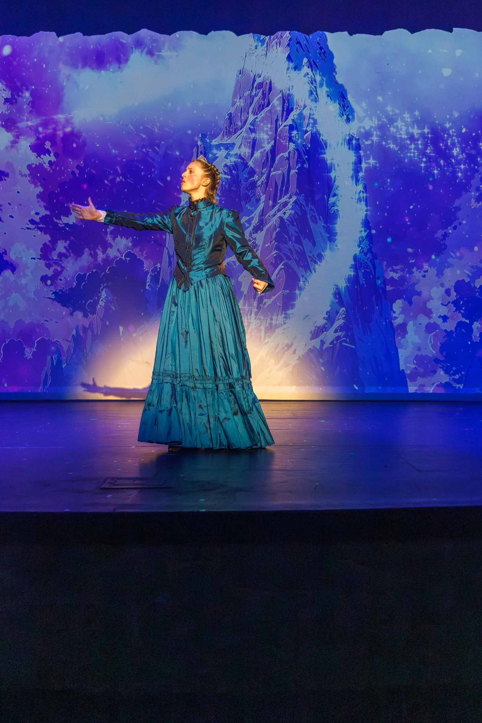 "Student performing as Elsa in Frozen the Musical, a production at Bedford Youth Performing Company, serving Bedford and Southern NH"