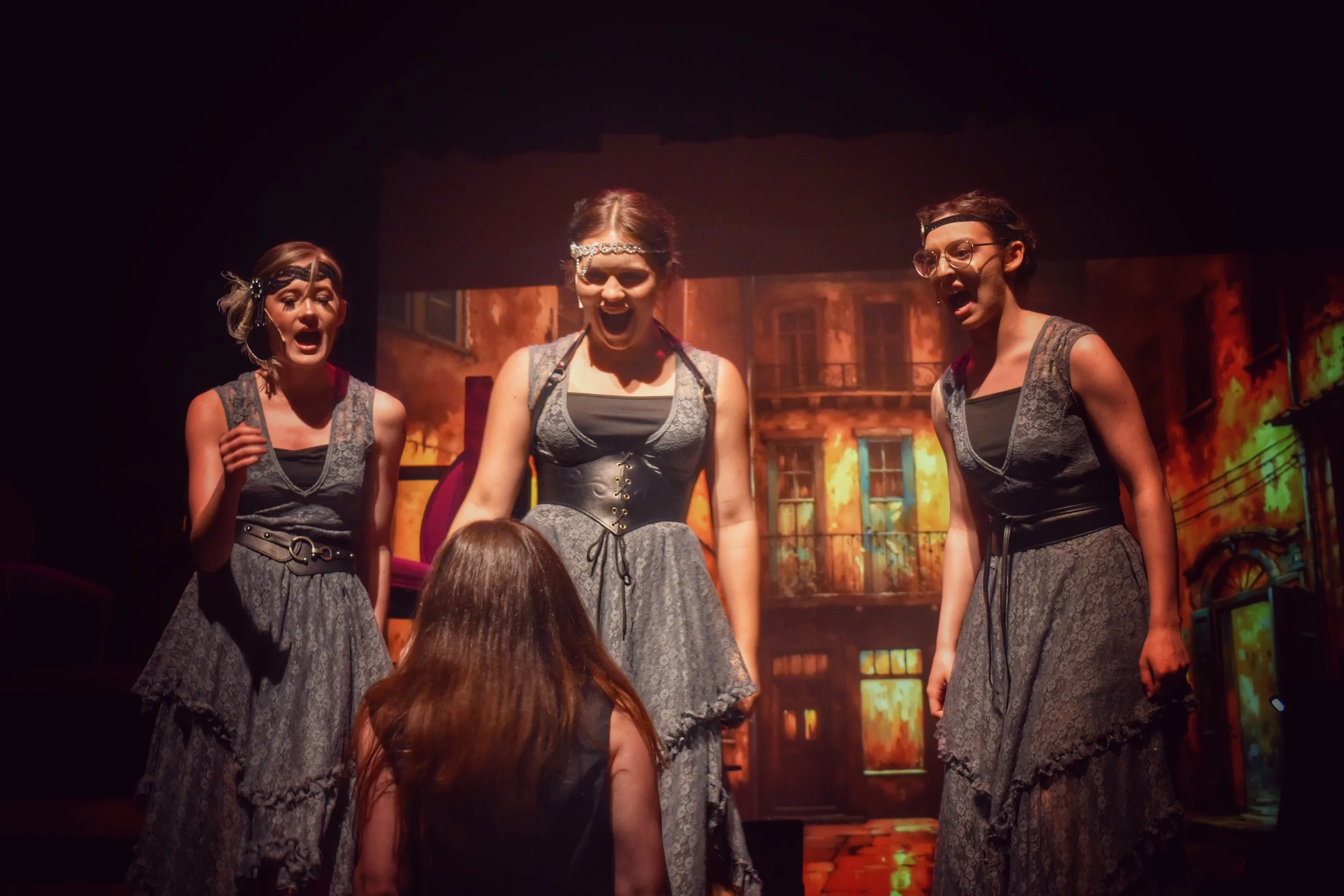 "Teen performers on stage in Hadestown School Edition in partnership with BYPC."