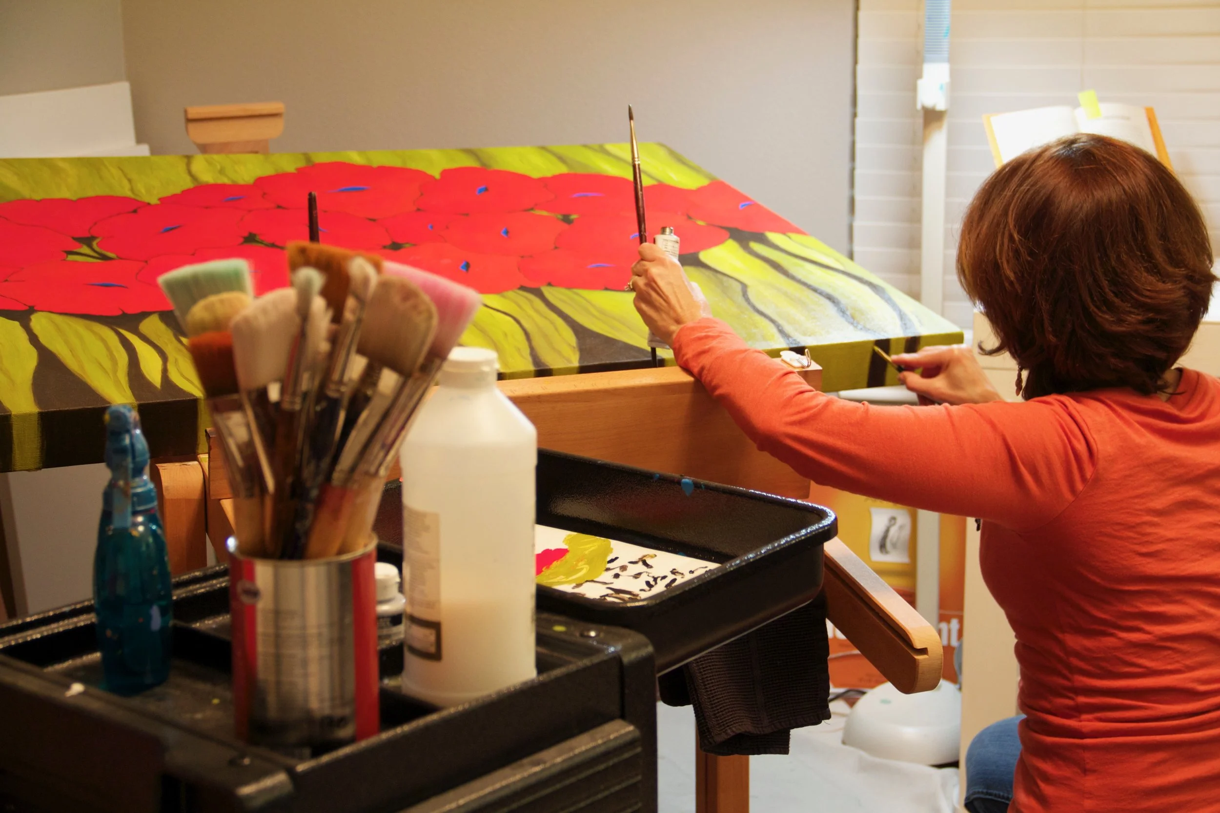 Looking back at this photo from my files (2012) inspires me to get back in the game. Putting the finishing touches on my painting that was selected for IMAGINE 2012 featured piece. Grateful memories!