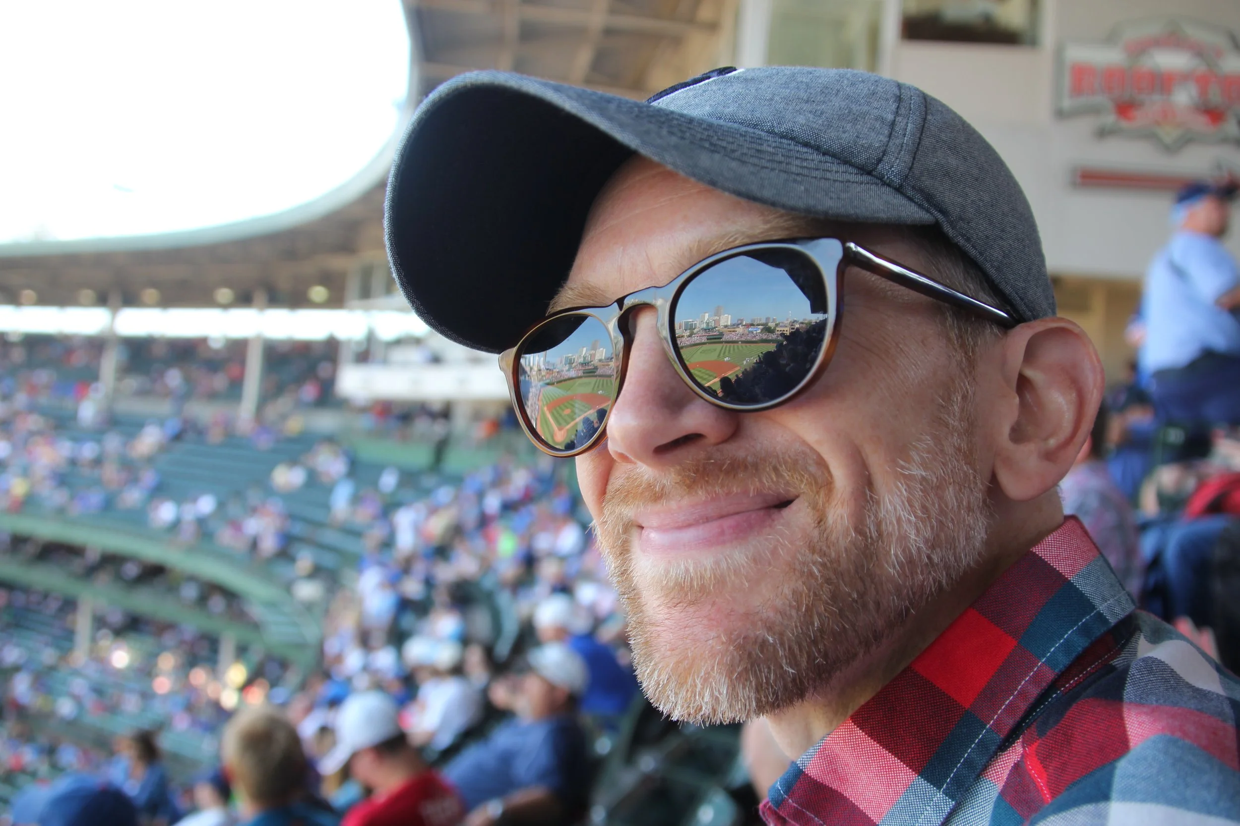 Tim at wrigely with field reflection in glasses.JPG