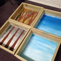 the start of something: four shadow boxes - one for each season