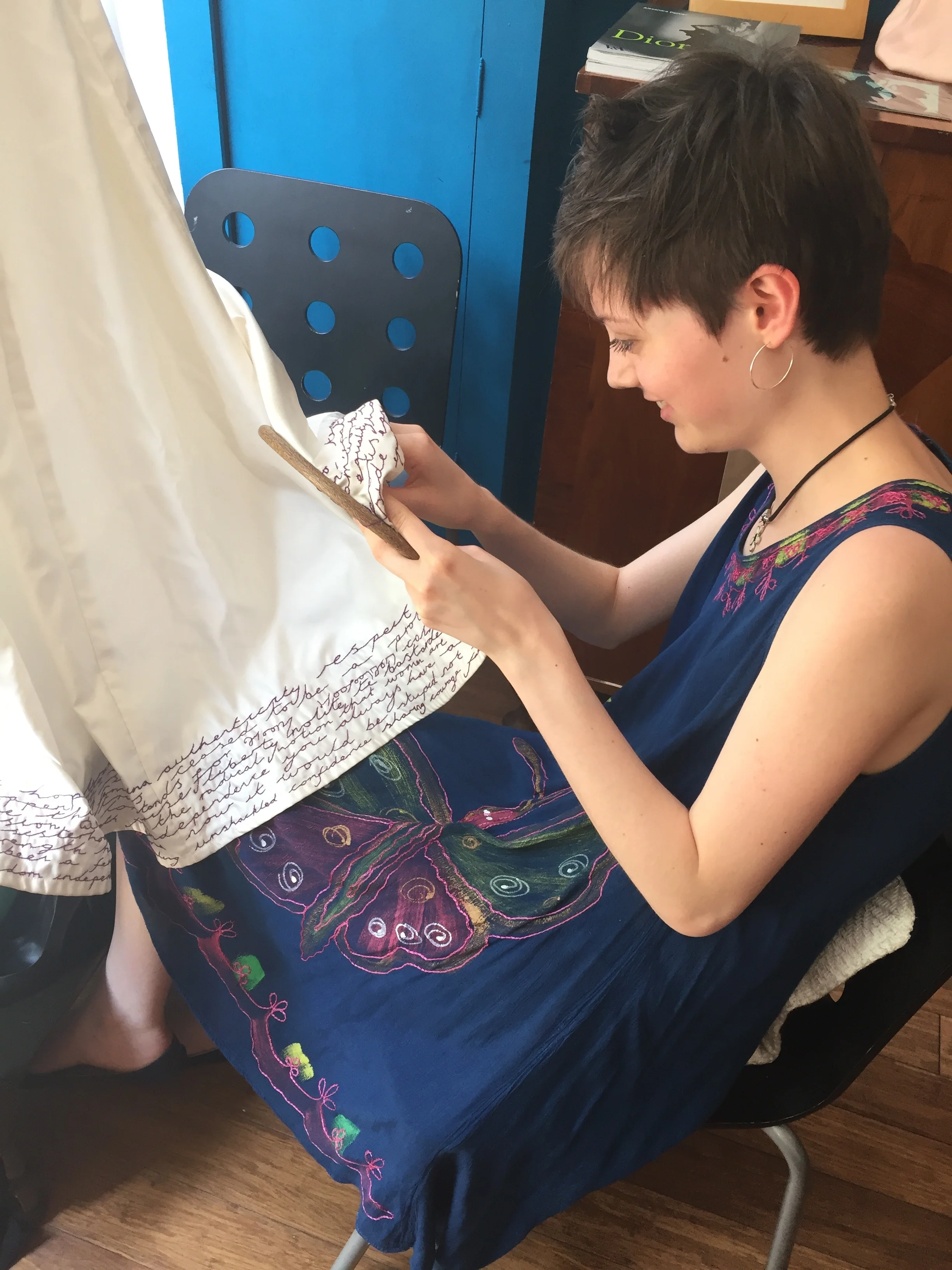 Daisy working on a hand embroidery project