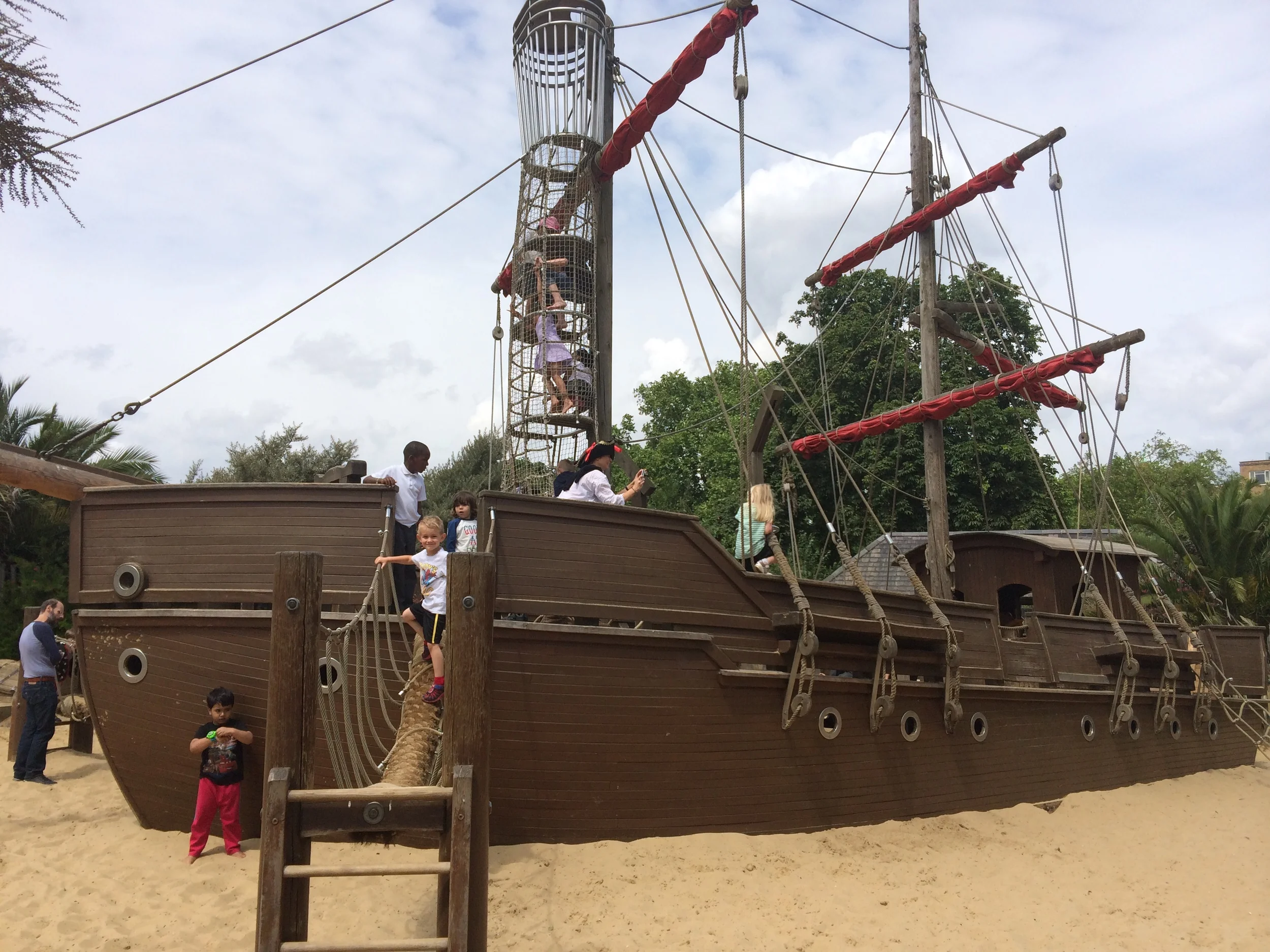 Kian on the Pirate Ship in the main section of the playground