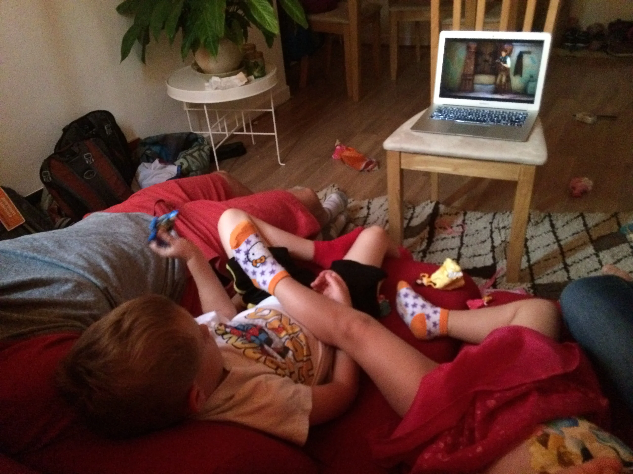 Everyone lounging together and watching a movie