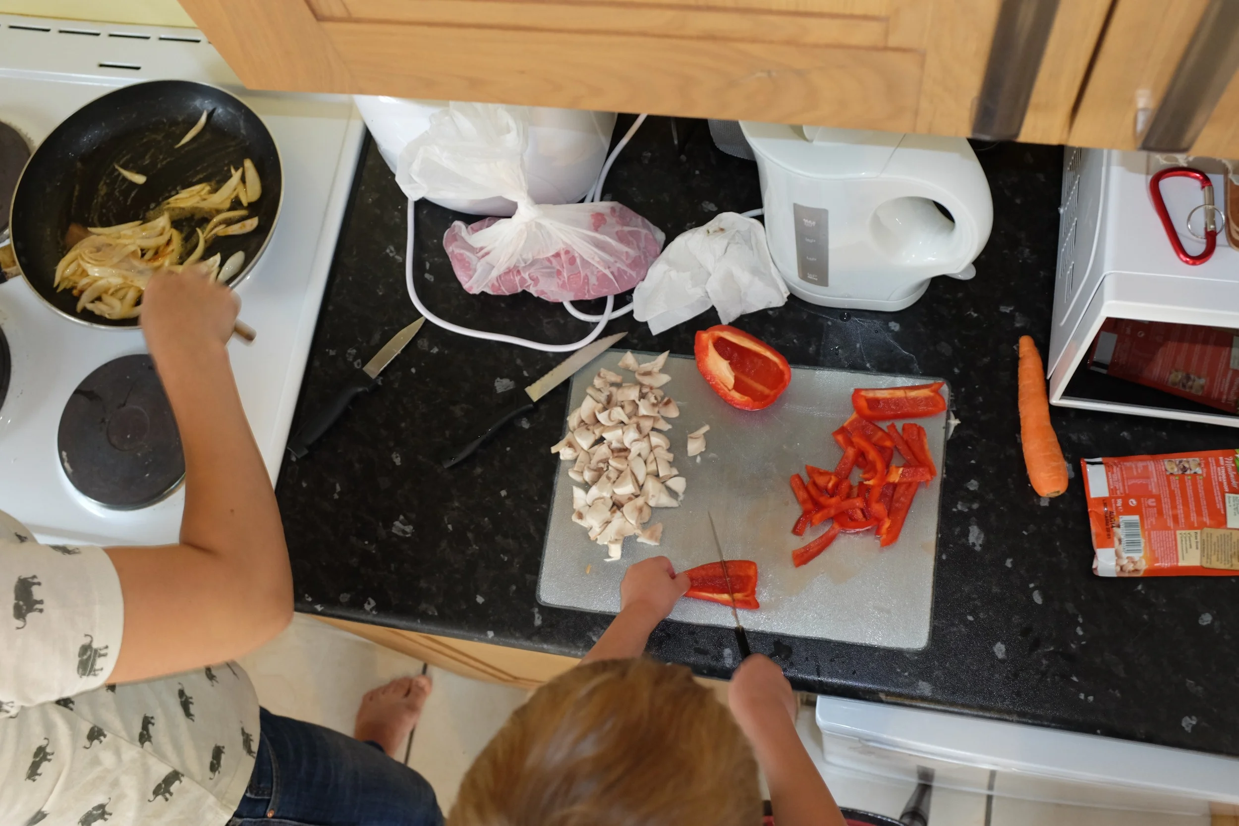Kian mastering the art of cutting peppers :)