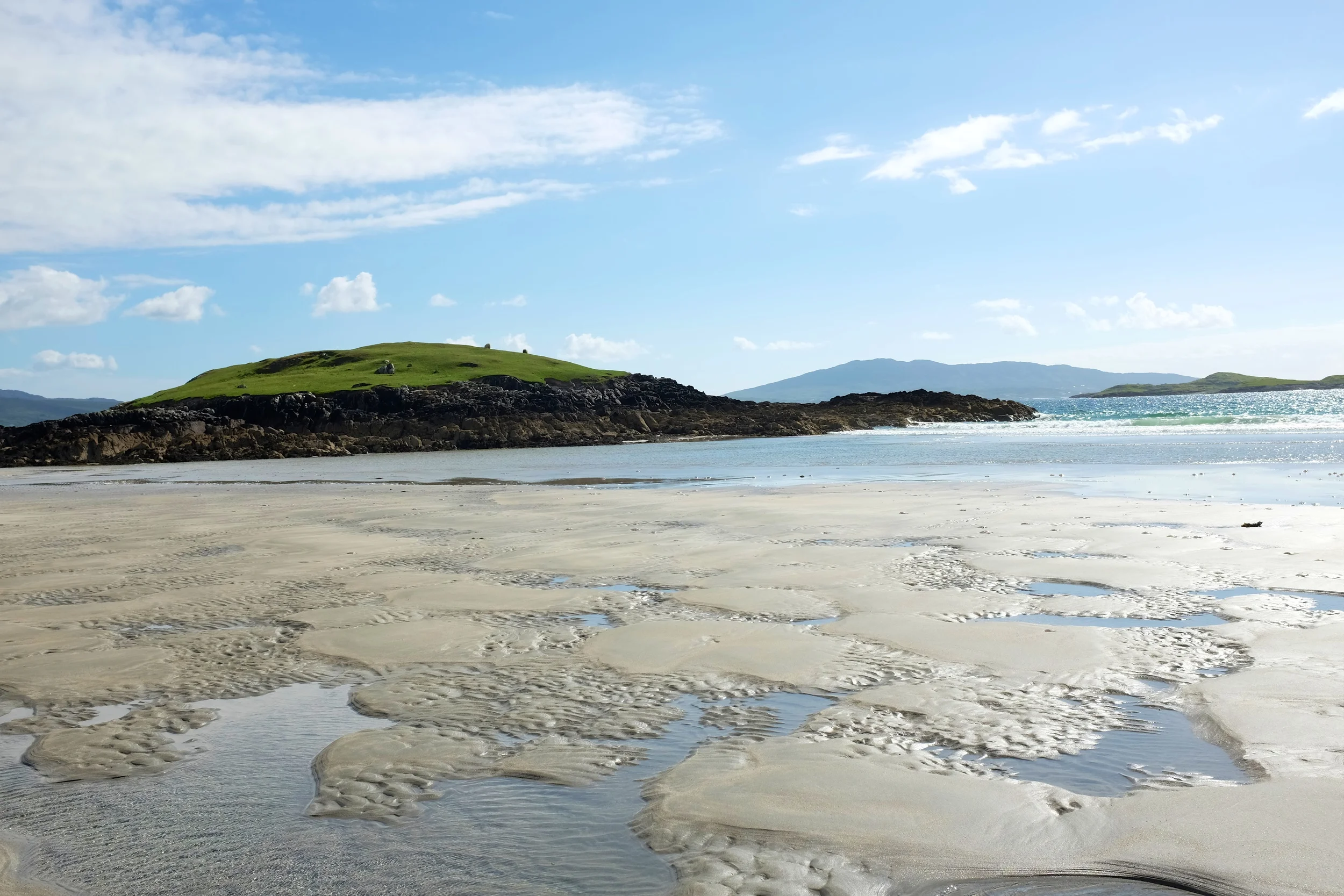 The small pools/streams on the beach