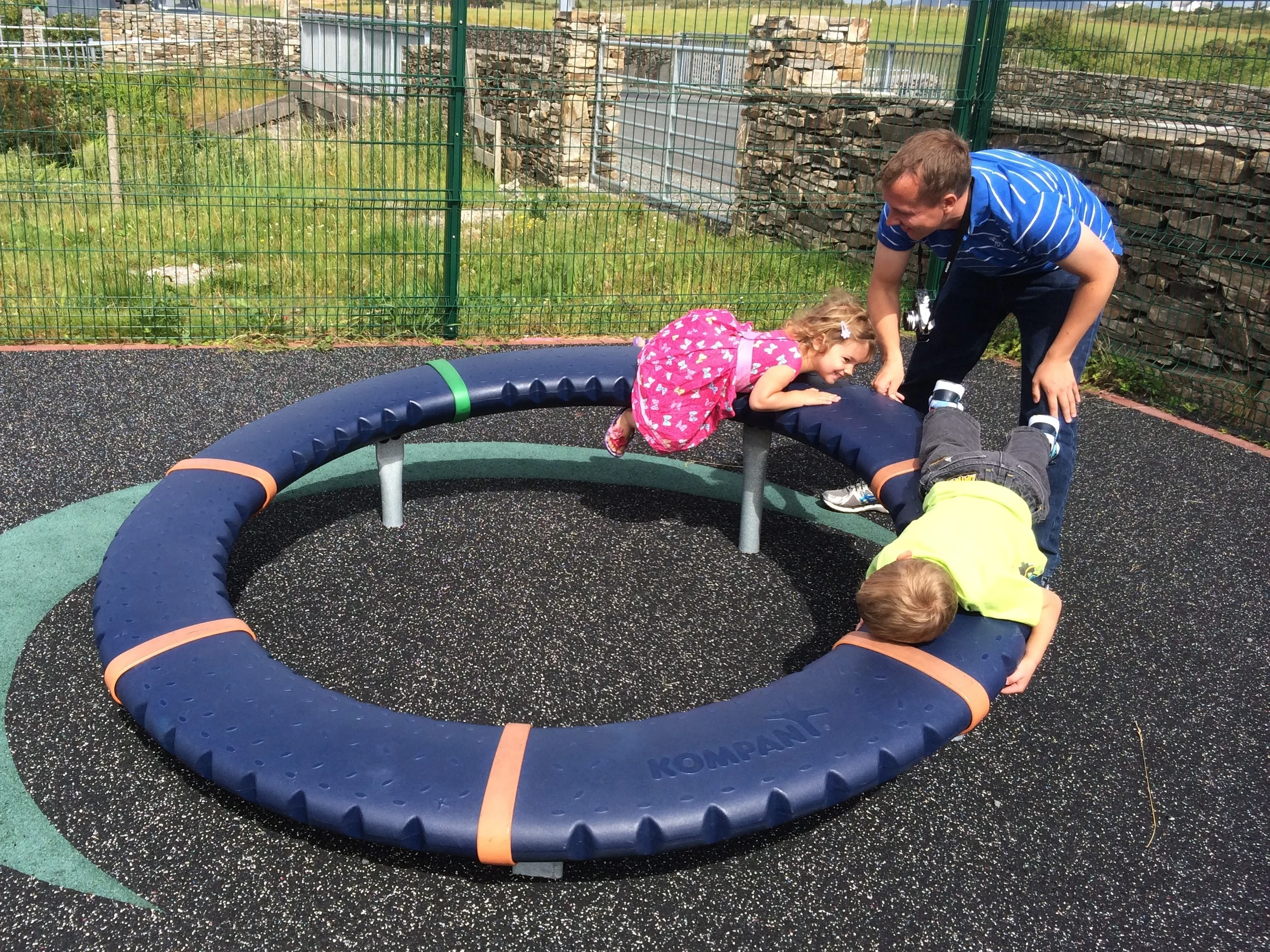 A circular spinning ride. You're apparently supposed to run on it and it spins as you do, but our kids preferred holding on while it spun.