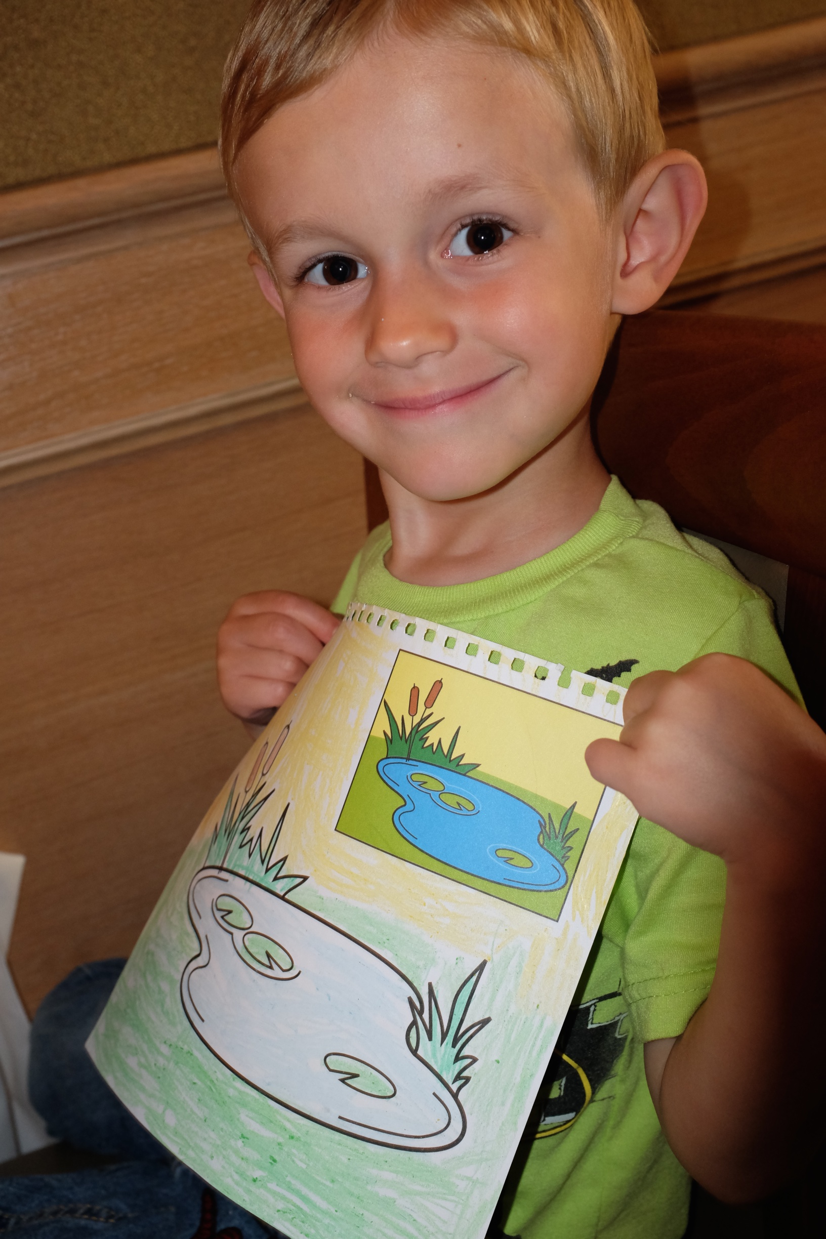Kian and his coloring page at the restaurant :) 