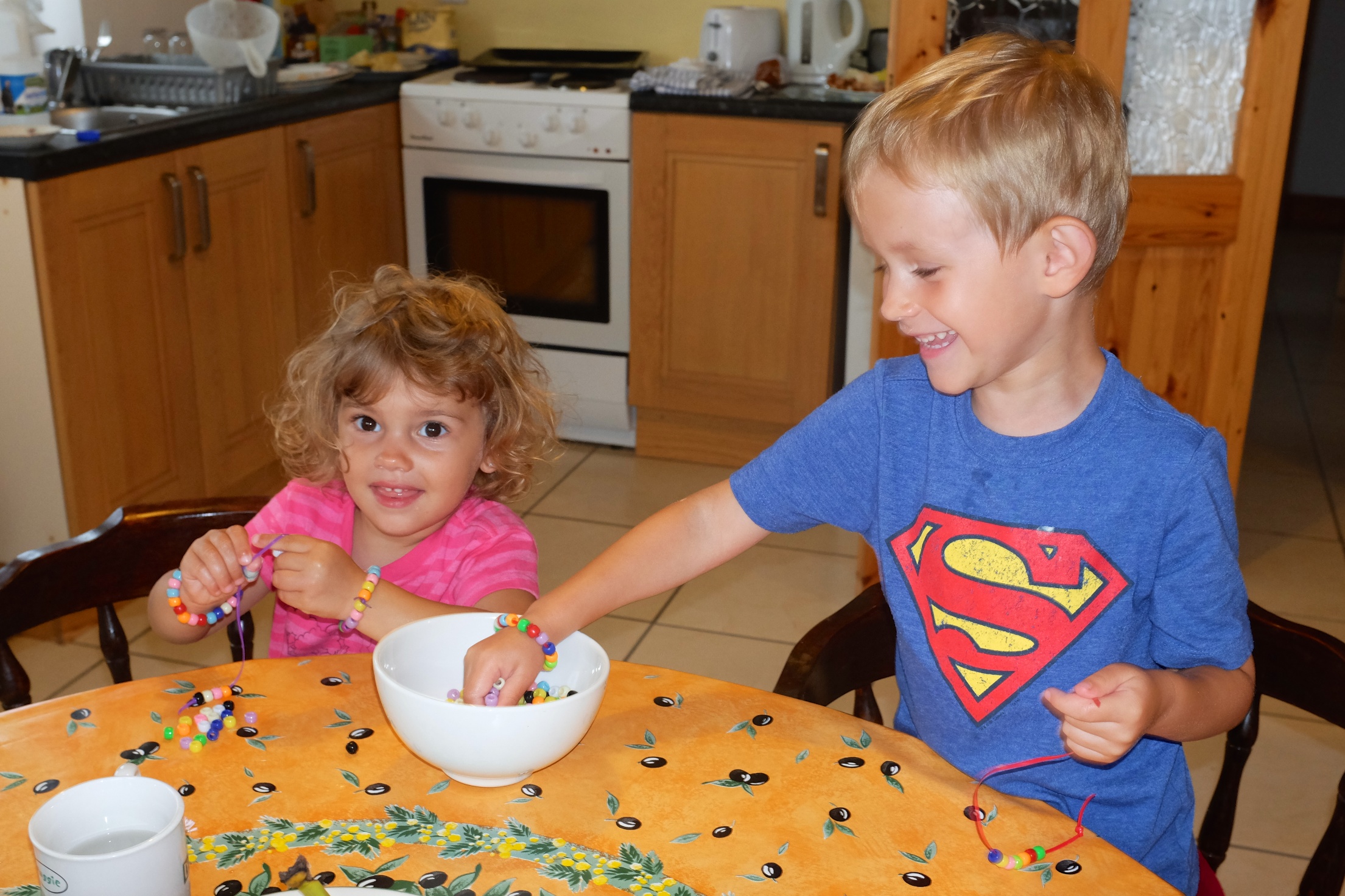 Working hard at making bead bracelets