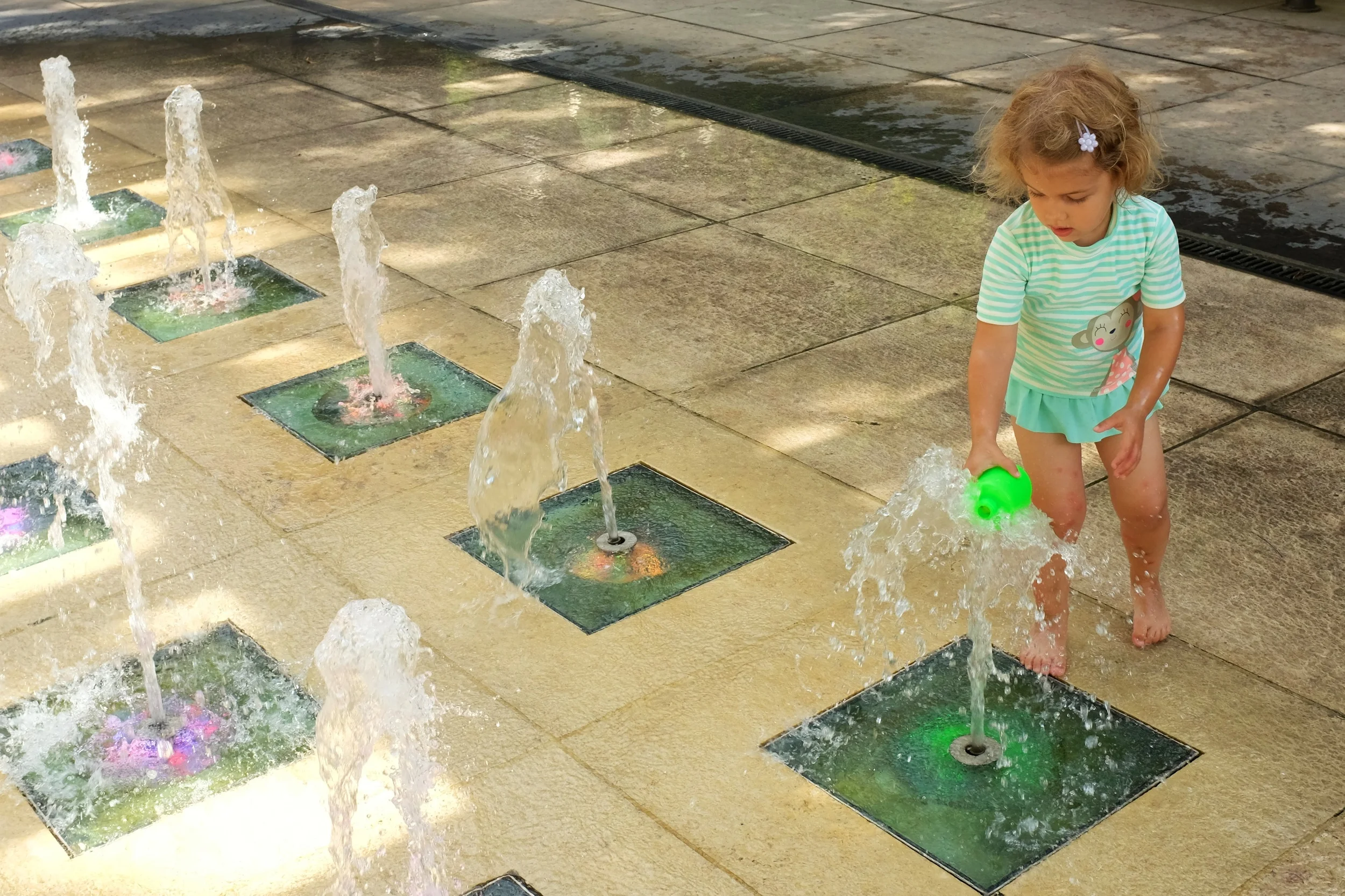 Hannah trying to refill her water gun