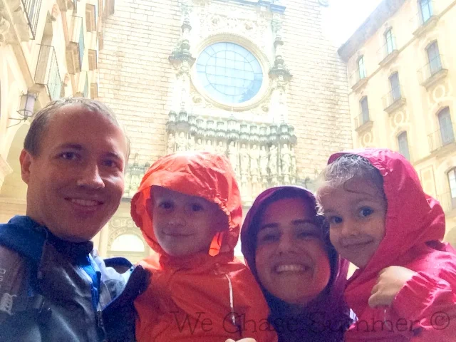 Drenched Family at Santa Maria de Montserrat Abbey