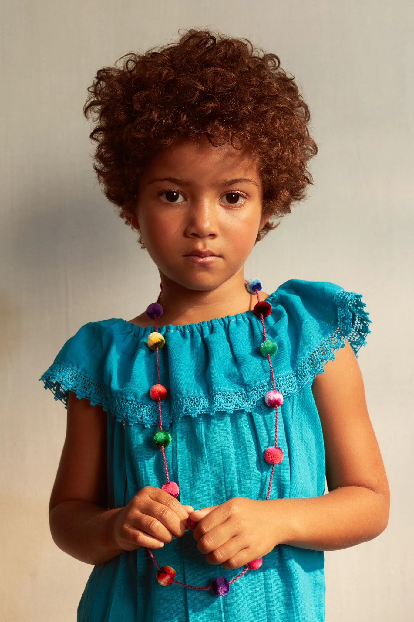 blue off-the-shoulder dress aya portrait pompom necklace aya.jpg