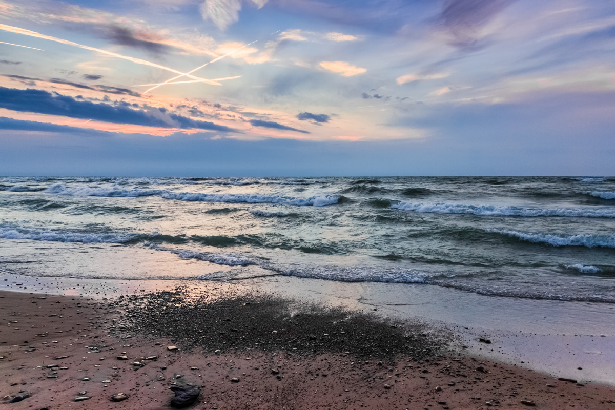 mich_day_summer_low_rocks_wavey_lake.jpg