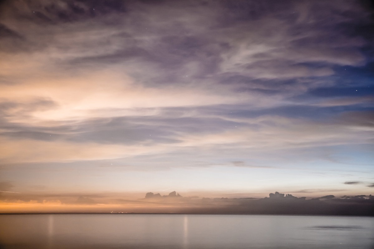 mich_night_summer_pale_muted_clouds_lake.jpg