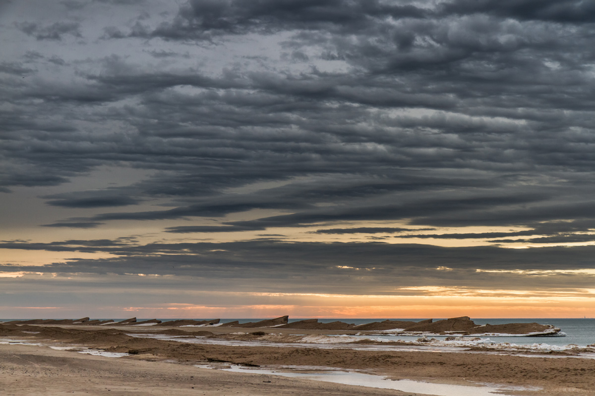 mich_sunset_winter_muted_snow_range.jpg