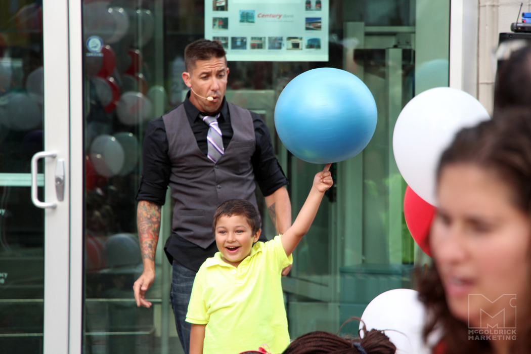 Boy balancing ball