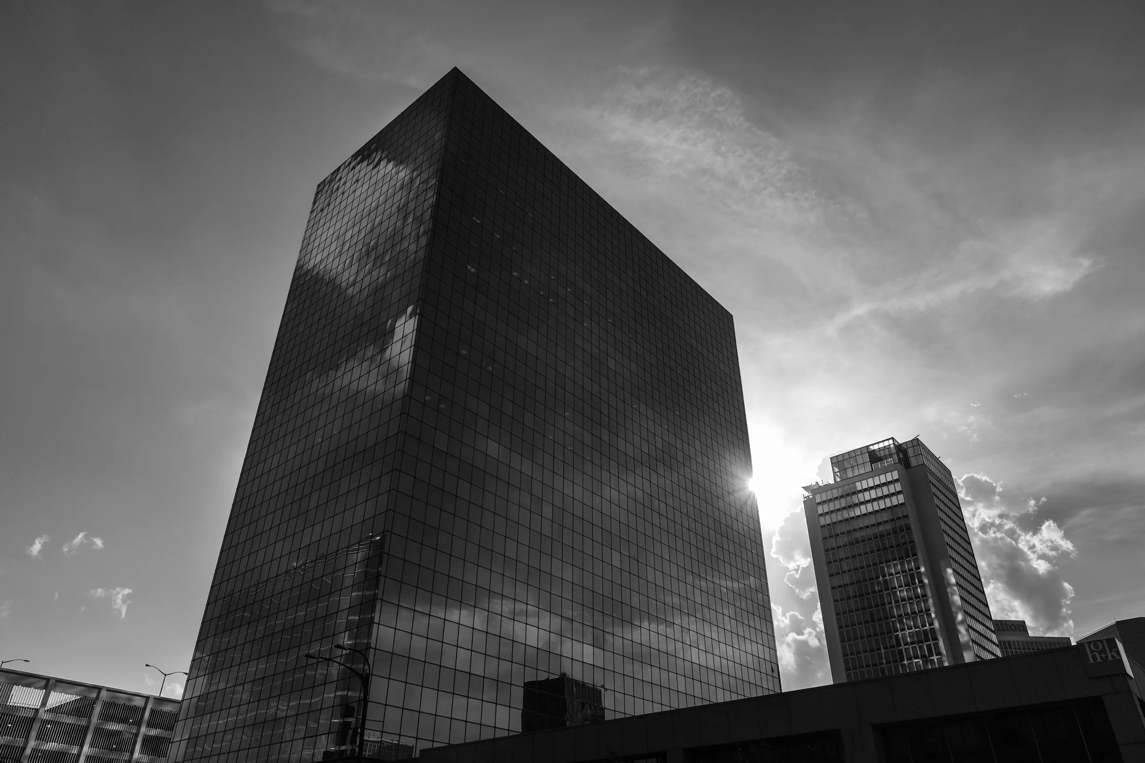 A sun star peers along the edge of the 10 Broadway building. Fuji X-Pro 2 and a Fujinon 10-24mm f3.5.