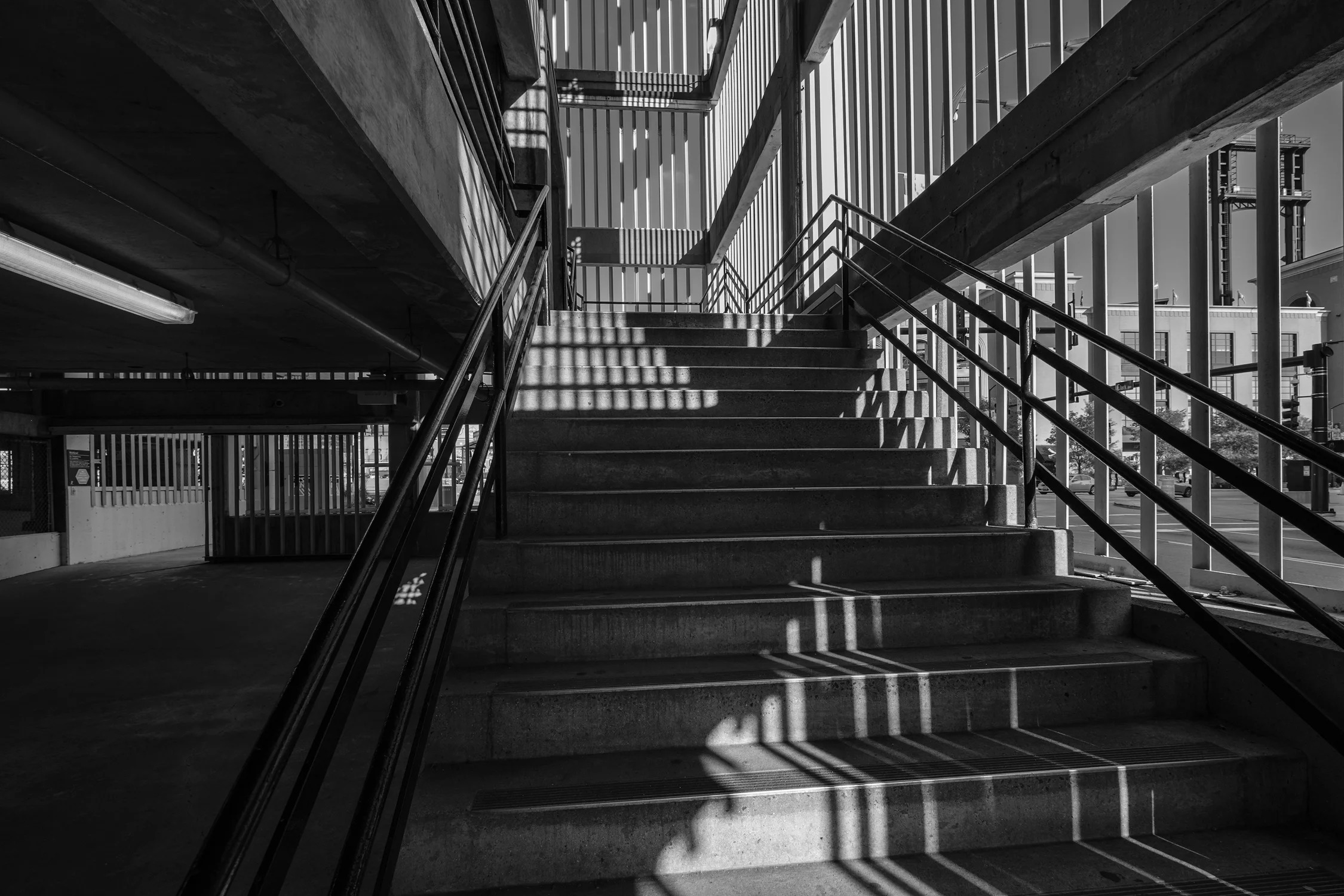 Crossing shadows climb a concrete stairway. Fuji X-Pro 2 and a Fujinon 10-24mm f3.5.