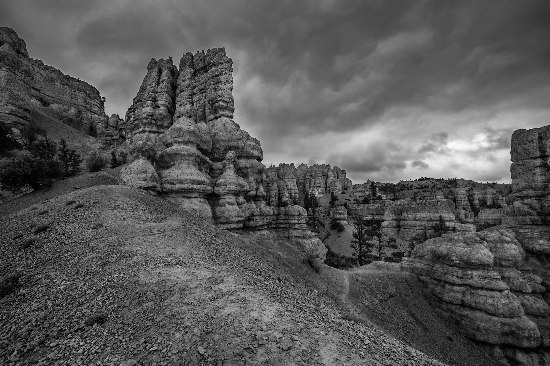 Storm clouds move over the hoodoos of Red Rocks, Red Rock State Park, Utah.