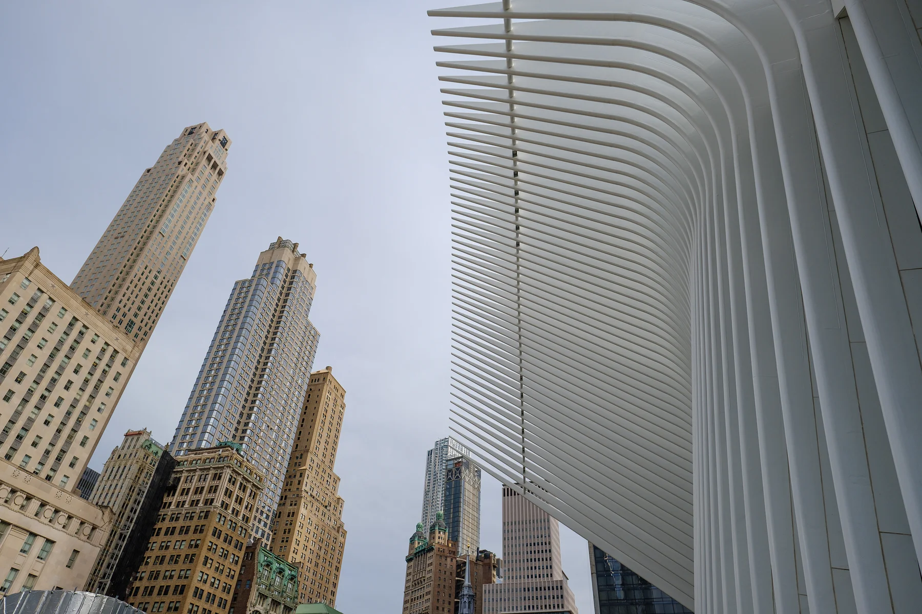 The linear forms of the Oculus super structure stand in stark contrast to the buildings of New York. Astia Film Emulation.