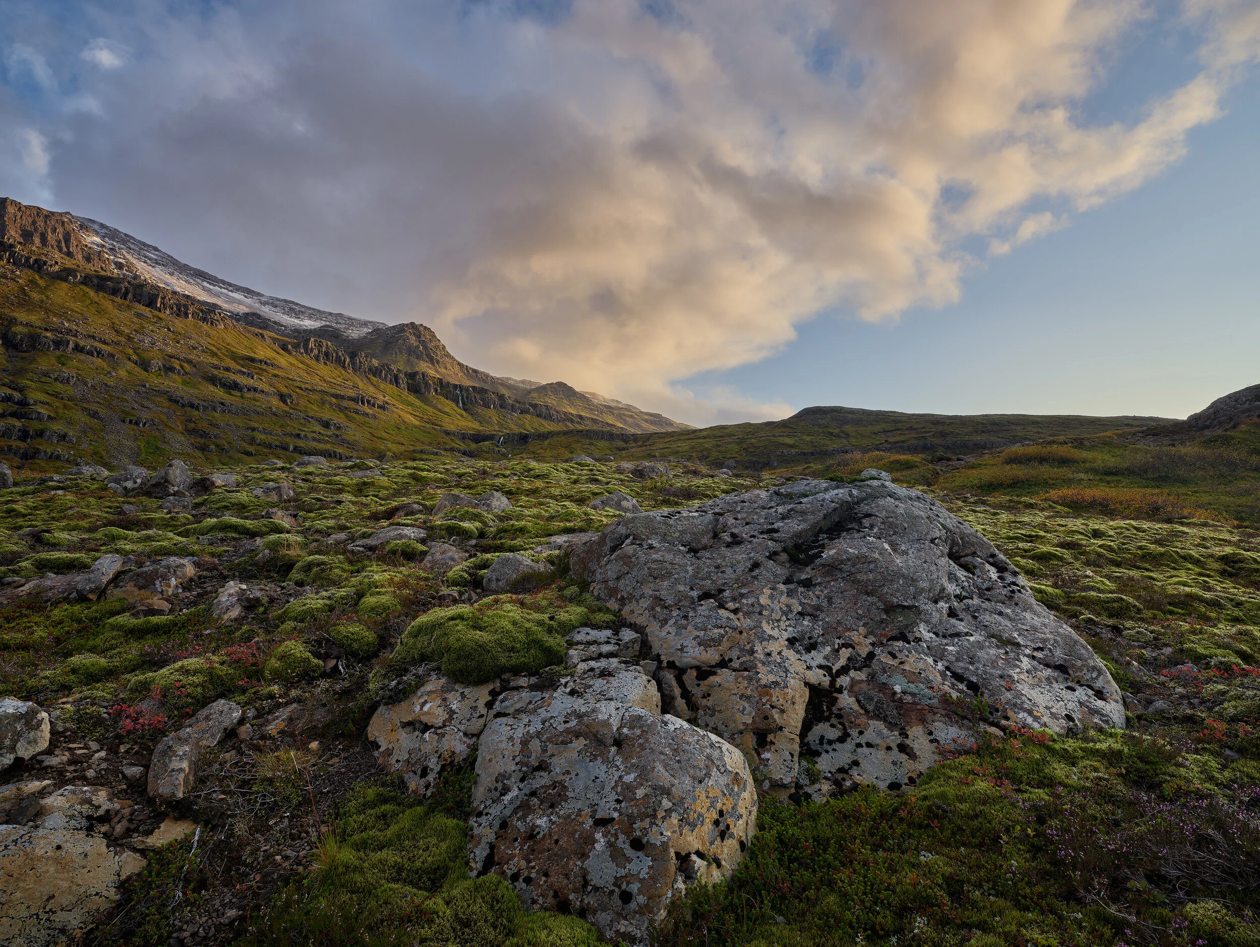 Above : Late afternoon light illuminates the mountains near Seyðisfjörður.