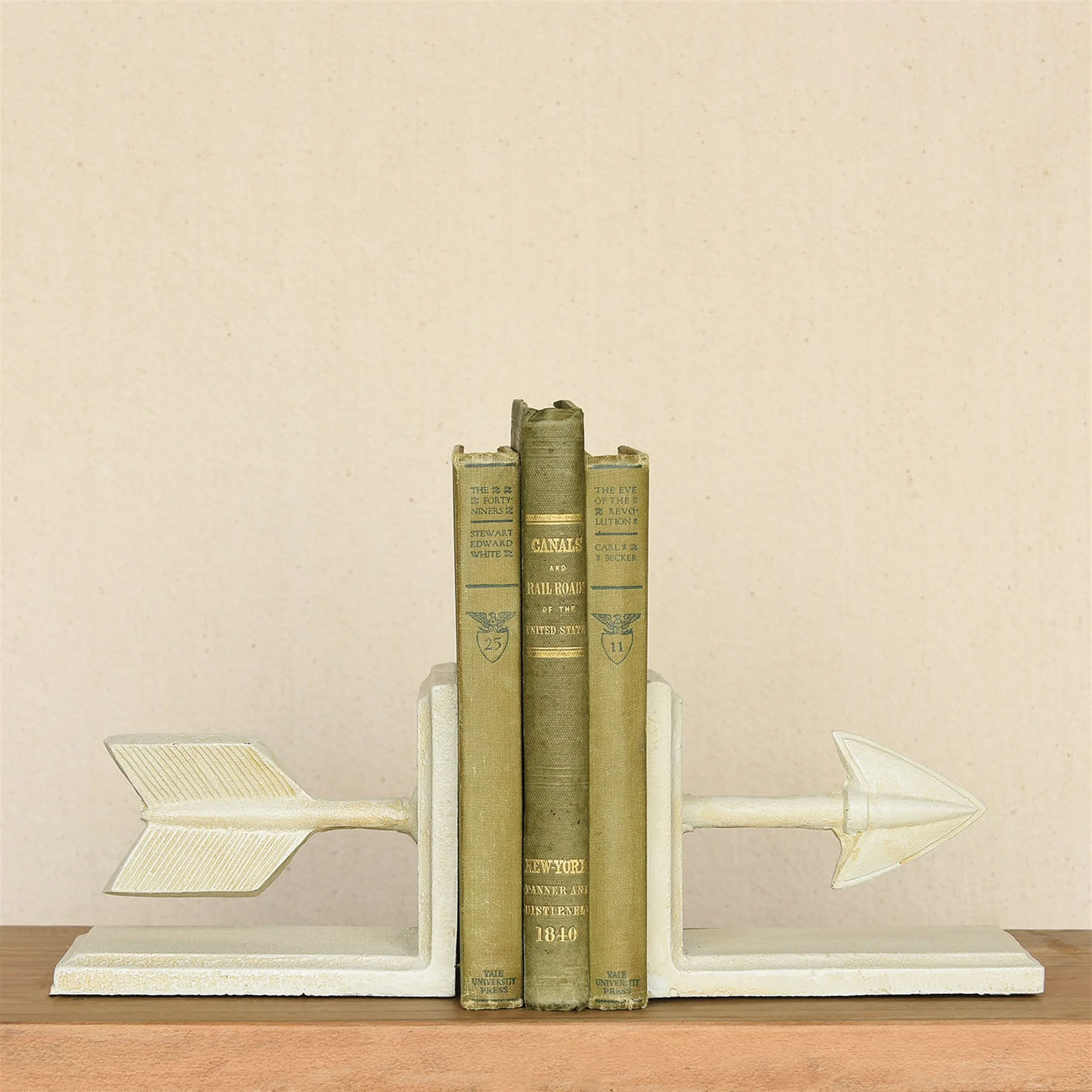white cast iron arrow bookends museum outlets