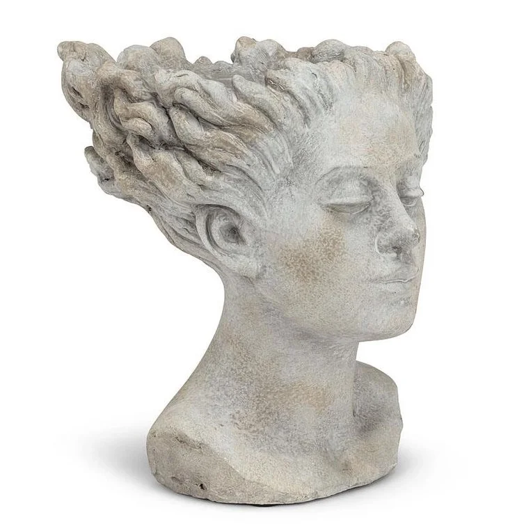 woman-blowing-hair-cement-planter-museum-outlets.jpg