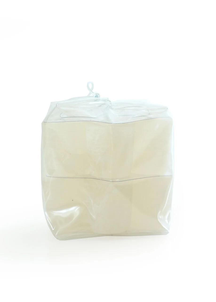 melon-white-votive-candles-vance-kitira-museum-outlets.jpg