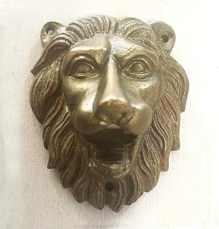 lions-head-wall-mount-beer-opener-museum-outlets.jpg
