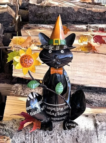 recycled-metal-jinx-kitty-holding-sunflower-halloween-decor-museum-outlets.jpeg