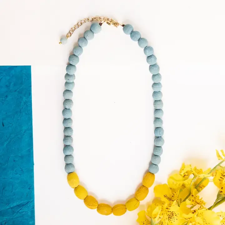 ocedan-mustard-couplet-necklace-fair-trade-kantha-jewelry-museum-outlets.webp