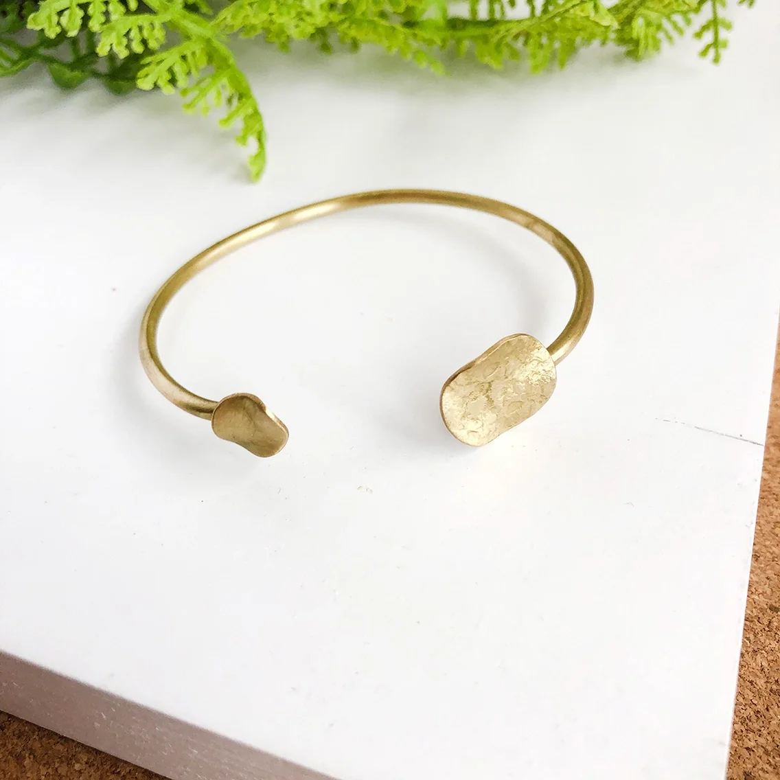 handcrafted-gold-bronze-metal-cuff-disc-bracelet-kantha-jewelry-museum-outlets.webp