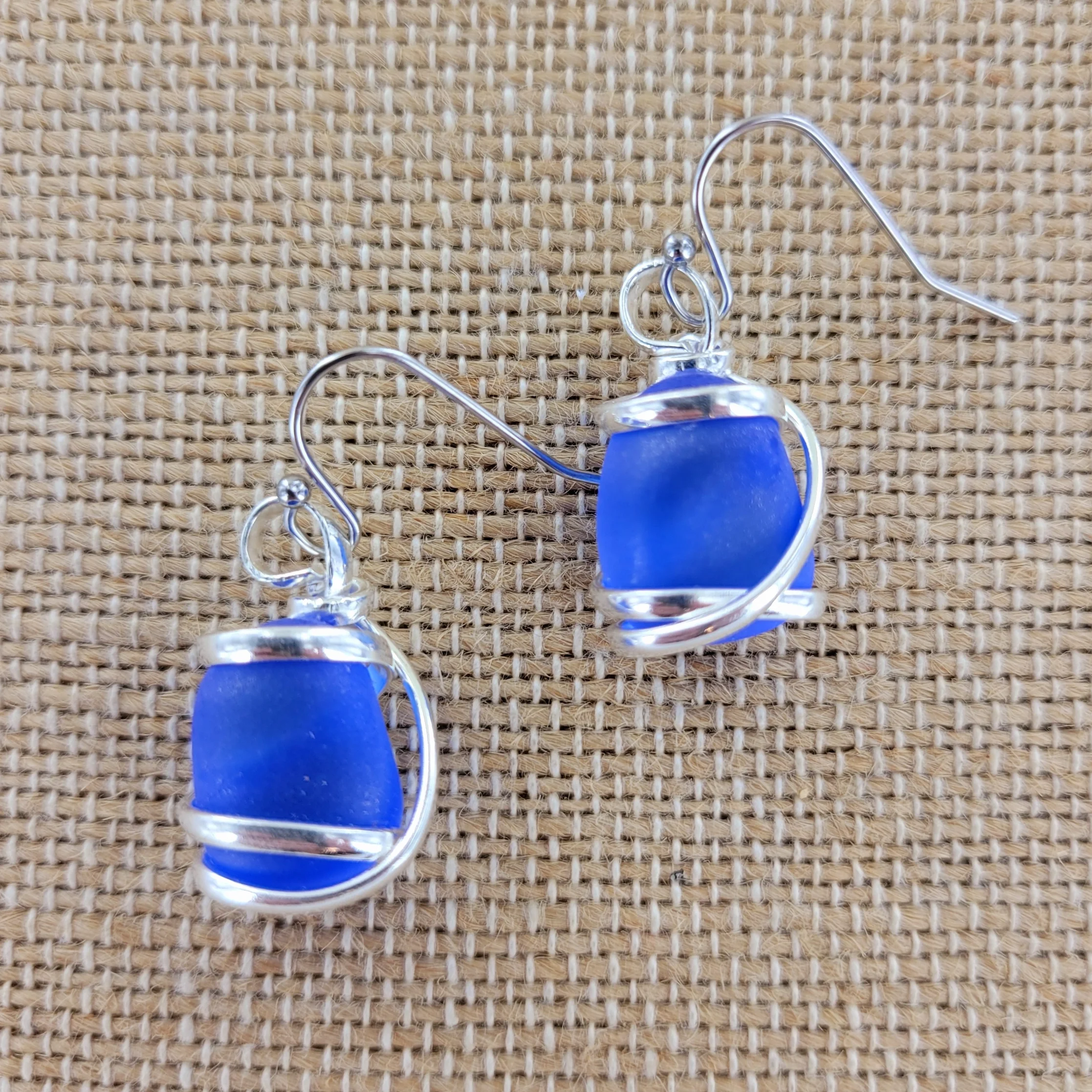 cobalt-sea-glass-earrings-museum-outlets.webp